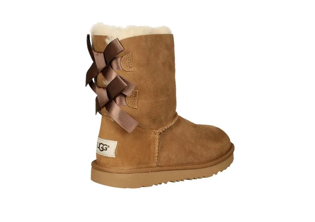 Leather boots with fur lining and rear tie design.